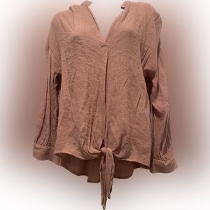Relaxed fit terracotta-colored shirt made from a crinkled fabric,